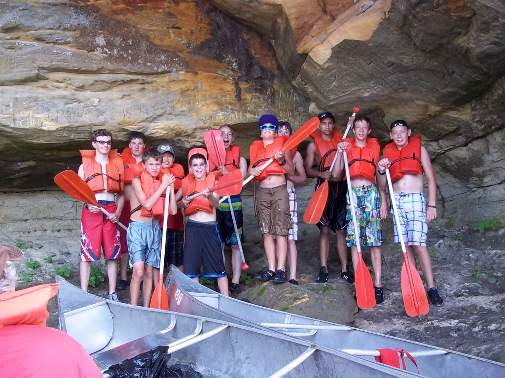 our group - posing at the cave carved into the bank