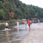 scouts, playing in the river